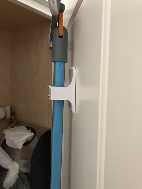 Pulls away from cabinet