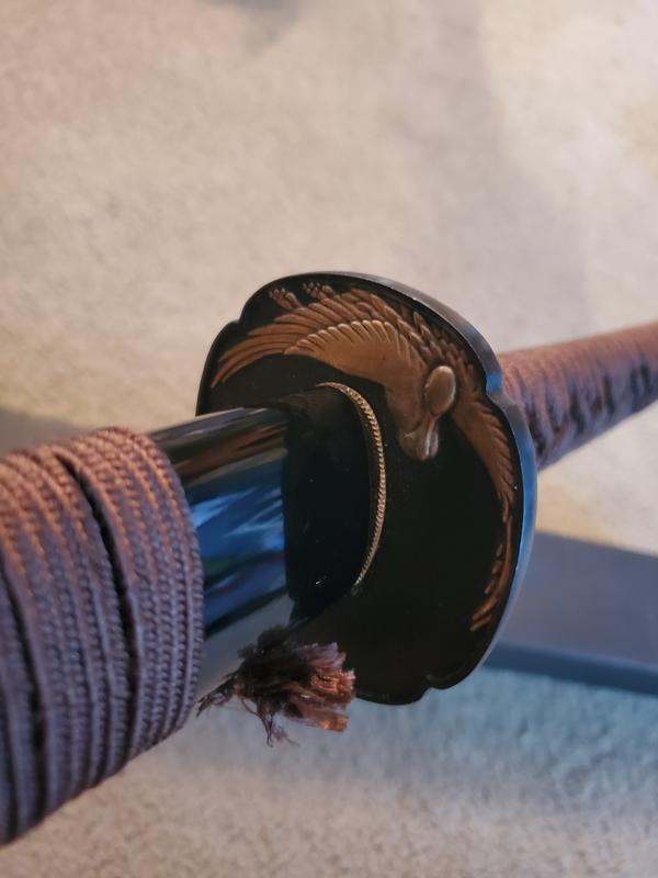 Tsuba with gold detailing