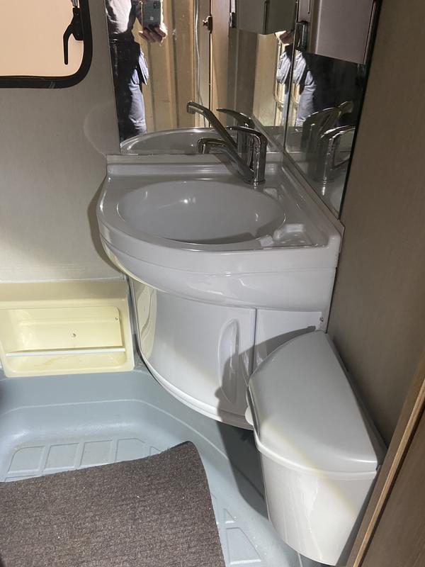 Corner washbasin and vanity unit at Camping Wagner camping accessories