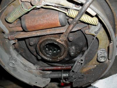 Remove Wheel Seal with a screwdriver and hammer- Don't damage the axle sealing surface