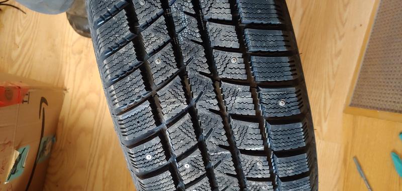 Missing studs, has lots of tread depth