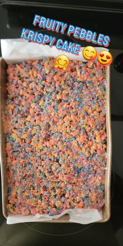 Pink tutti fruity pebbles cereal cake