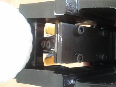 Un clou coincé dans la sortie.