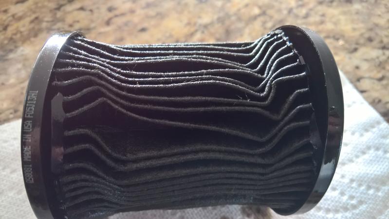 Plastic seals sheared open on both sides.