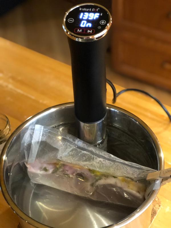 Pork chops in water bath in FoodSaver sealed bag