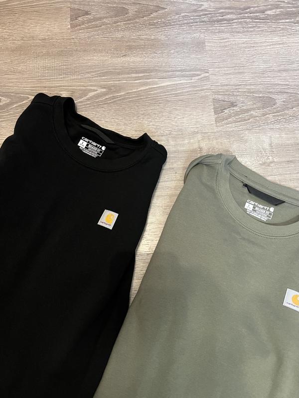 Both larges (just the black had been washed and the green wasn't yet) that's how much it shrinks