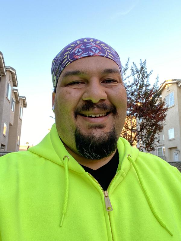 Selfie wearing extremely bright neon yellow green sweater