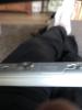Try loosening the screw to change the battery