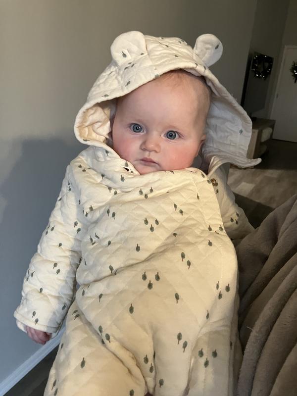 Cozy comfort and warmth in this precious onesie.