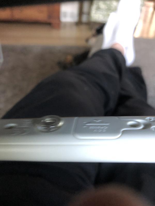 Try loosening the screw to change the battery