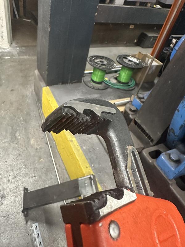 The little jaws on the side help the wrench grab at an angle