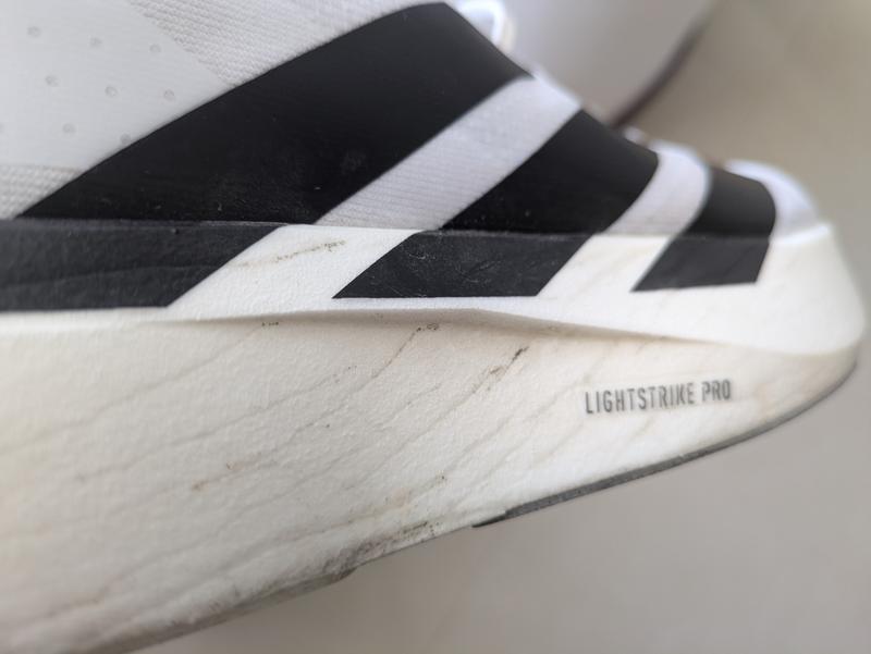 adidas adizero Evo SL M FOOT WEAR WHITE/CORE BLACK/FOOT WEAR