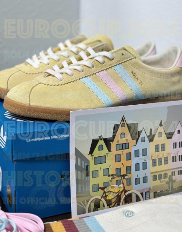 adidas KOLN 24 ALMYEL/ALMBLU/CLPINK（アディダス ケルン 24