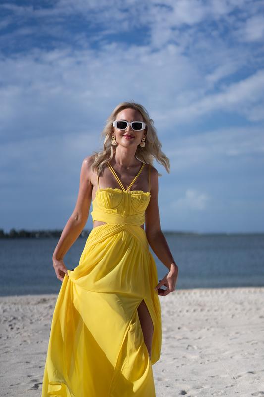 asos yellow skater dress 10 ASOS DESIGN ruched bust strappy cut out maxi skater dress in yellow