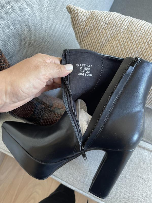 ASOS DESIGN platform heeled boots with pointed toe in black faux