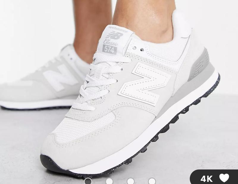 New Balance 574 trainers in metallic white and silver