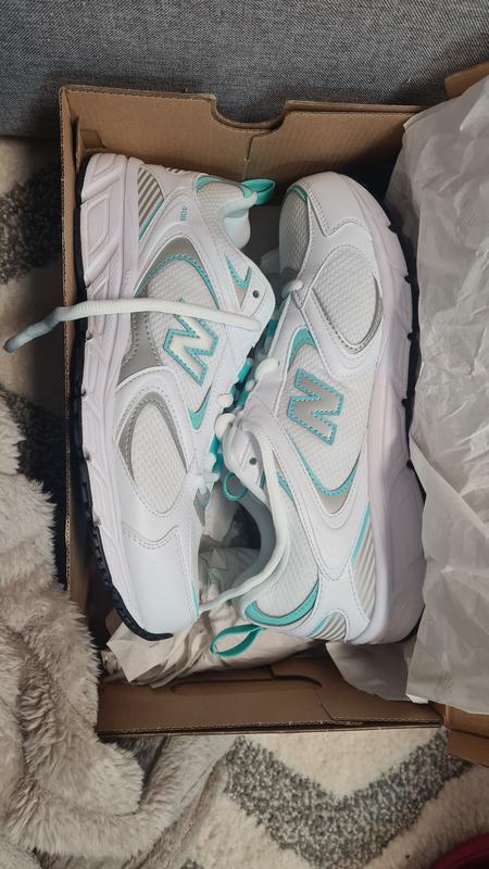 new balance 408 trainers in white and light blue