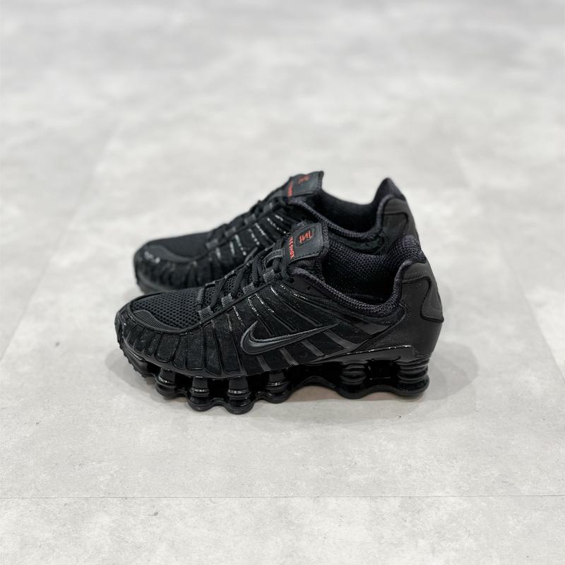 NIKE W SHOX TL BLACK/BLACK-MTLC HEMATITE-MAX ORANGE 24SP-I