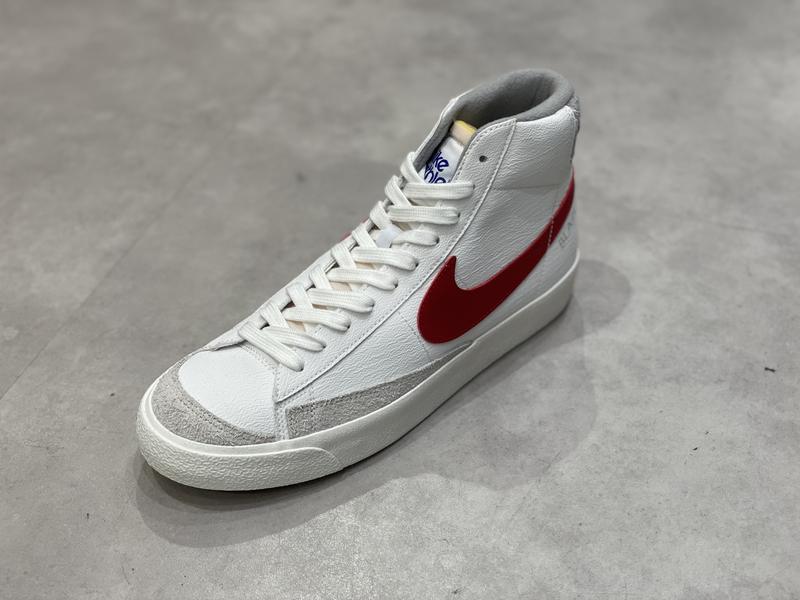 NIKE BLAZER MID '77 WHITE/GYM RED-LT SMOKE GREY-PHANTOM 22SP-I