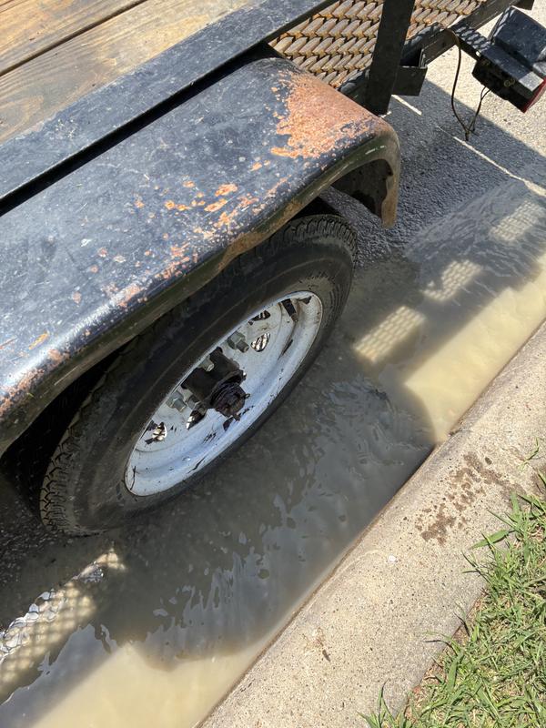 My huband changing our trailer hub.