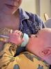 Will take from me or my husband. Snuck bottle in during his night dream feed one night - success! At around 3 months old