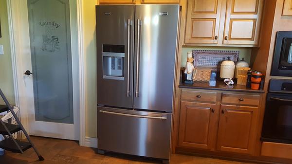 Maytag refrigerator making popping noise