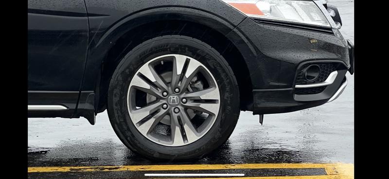 Wet tire, 30,000 miles, badge-inspired side