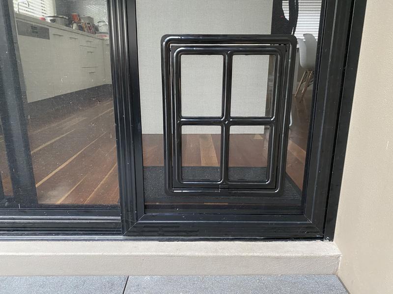 Security screen door hotsell with pet flap bunnings