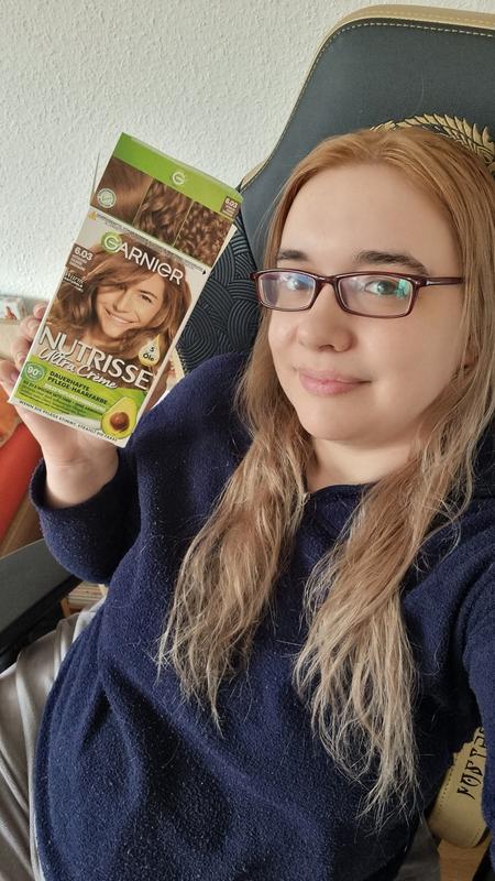 Die Haarfarbe auf vorher blondierten Haar