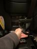 Seat strap has shoulder strap entangled.