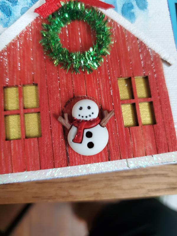 This is a dress it up button with a plastic shank.  Cut it off and sand the back to make it flat.  (Snowman)