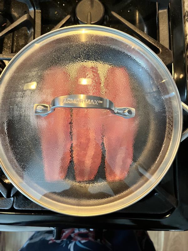 Cooking bacon with a lid on