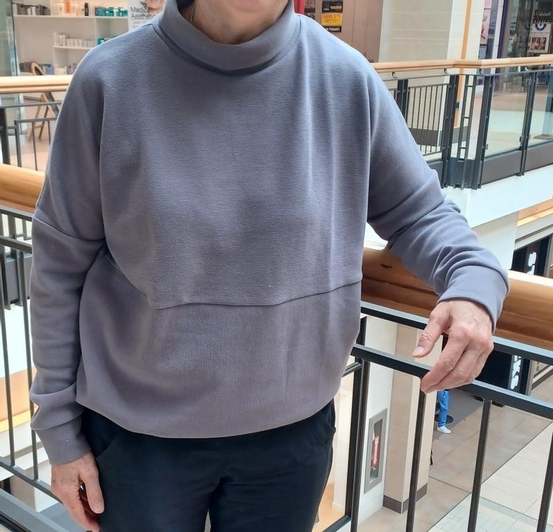 Adding a row of elastic at the bottom made this top more suitable for an older woman