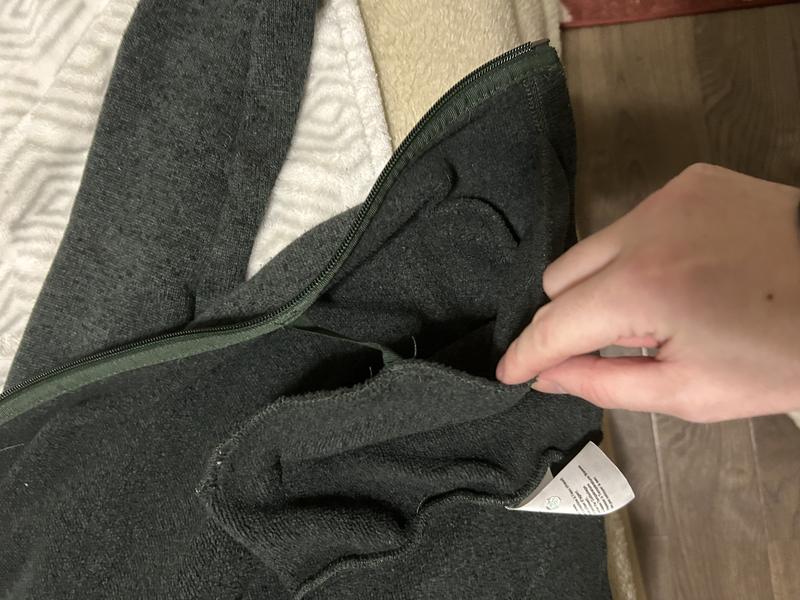 Side by side shots showing how the two sweaters are clearly the same pattern with minor differences except for the travesty that is the pocket sewing.