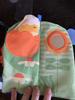Baby chick goes in and out of pocket and sweet flower mirror