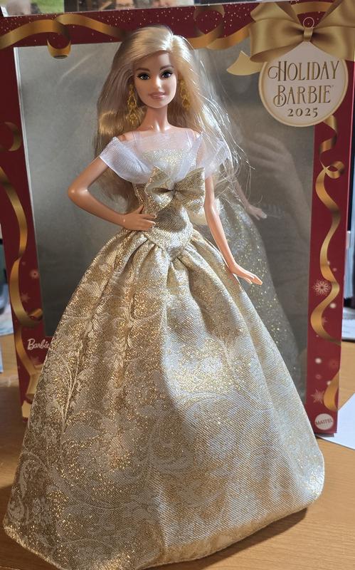 Barbie standing with pedestal, showing full dress.