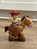 Jessie riding Bullseye side view