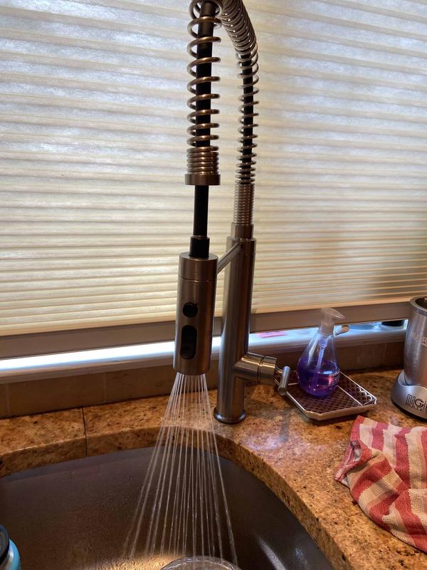 With the Spray on.  stays on until pressed off.