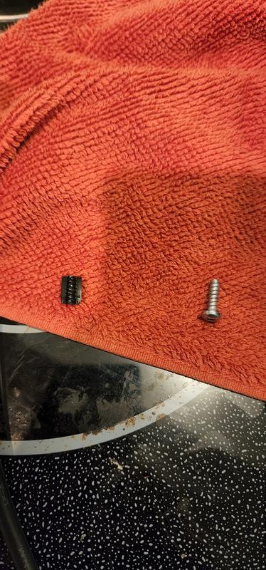 Broken plastic, motor mounting screw