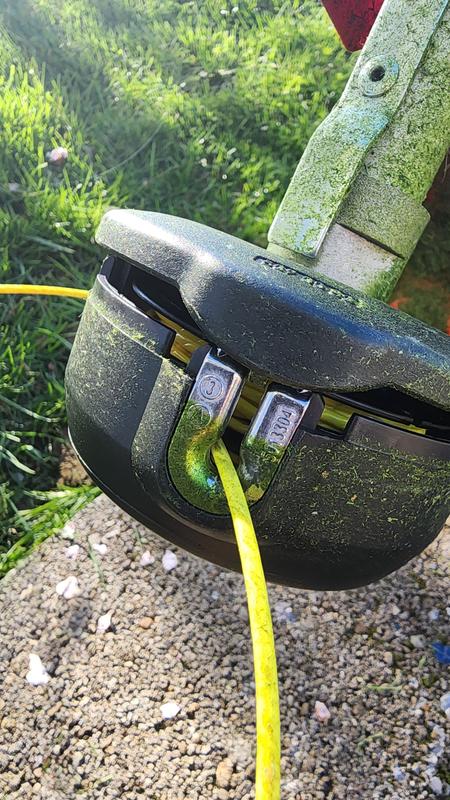 Pulled the trimmer head so you can see how easy it is to "thread" new line.