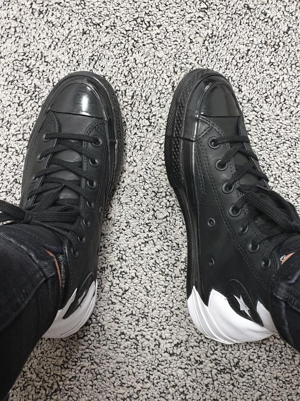 half black half white converse shoes