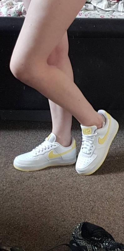 nike air force with yellow tick