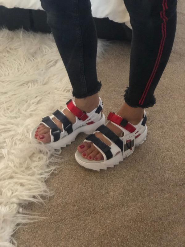 fila sandals on feet