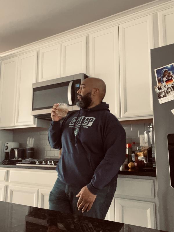 I am currently relaxing and enjoying a refreshing glass of water.