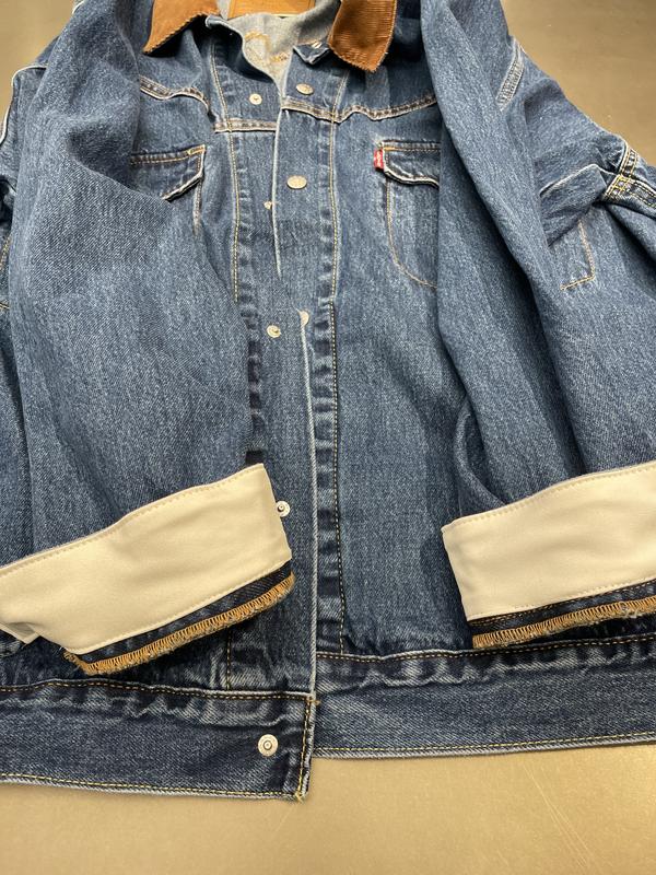 We took it to a Levi’s tailor and had some small alterations done! We added material from my wife’s wedding dress inside the cuffs.