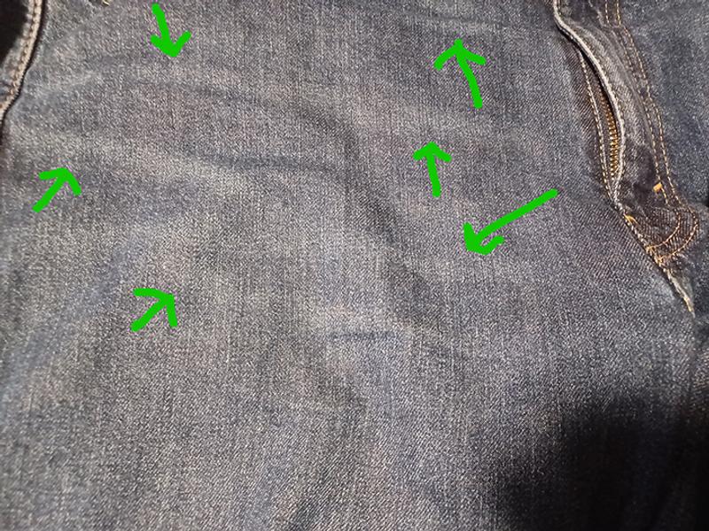 Arrows show faded lines (NOT Creases). Circled are pin holes and to show paper thin material after 3 Washes.