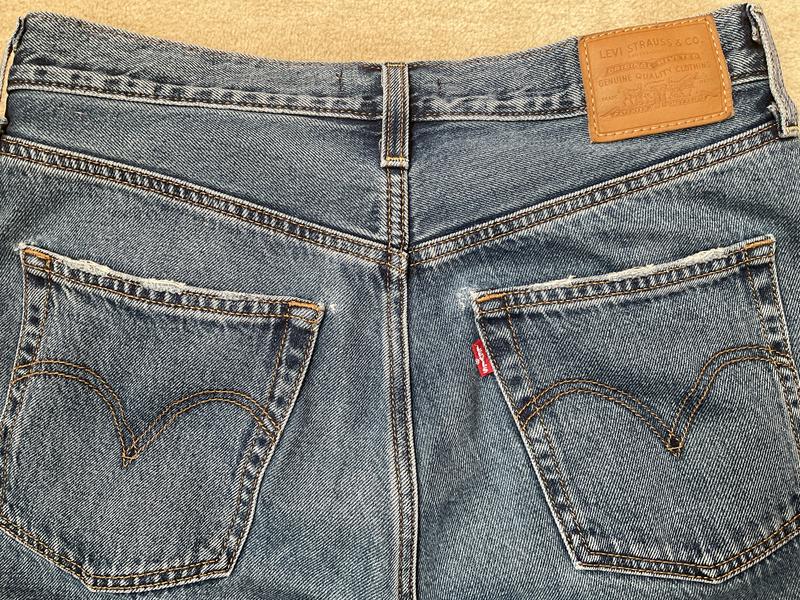 Risse rechts und links an der Tasche (oben)