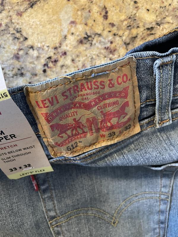 Damaged label, tags half removed, looks like this was returned by someone already