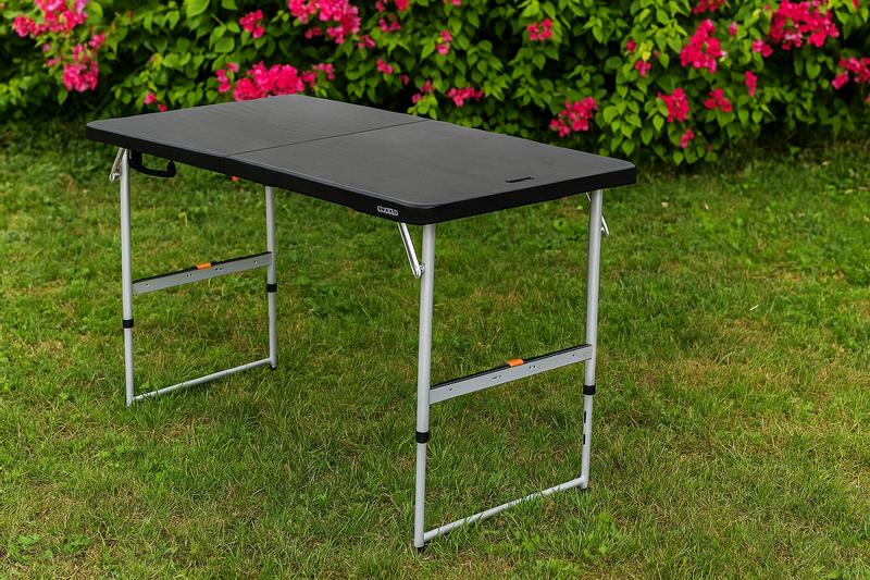 You can raise and lower the height AND it folds in half for easy transport!