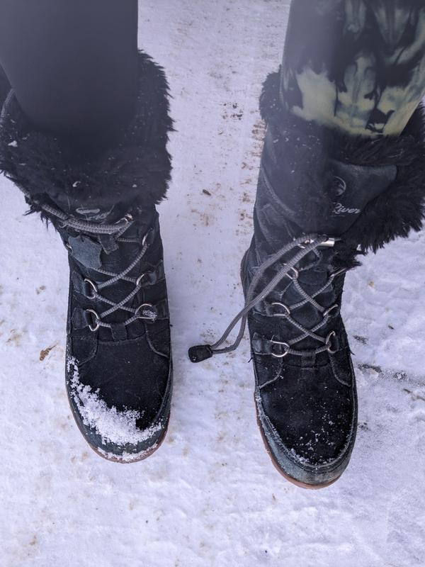 Cinched lace with tag,  that can be stepped on causing a fall